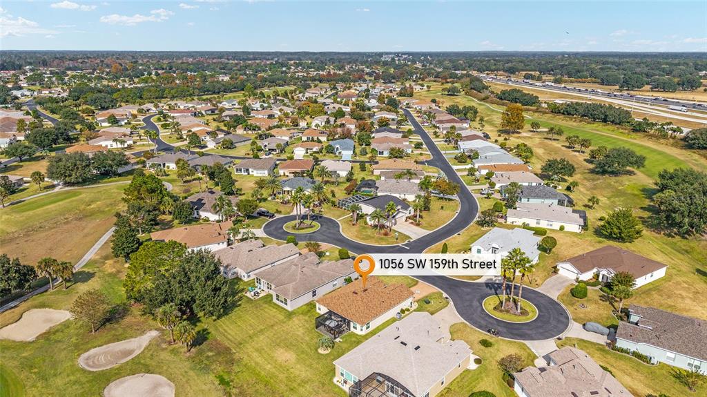 1056 Southwest 159th Street Ocala, FL 34473 - Photo 43 of 45 an aerial view of a city