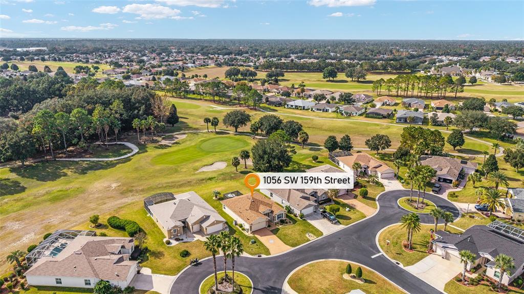 1056 Southwest 159th Street Ocala, FL 34473 - Photo 44 of 45 an aerial view of residential houses with outdoor space