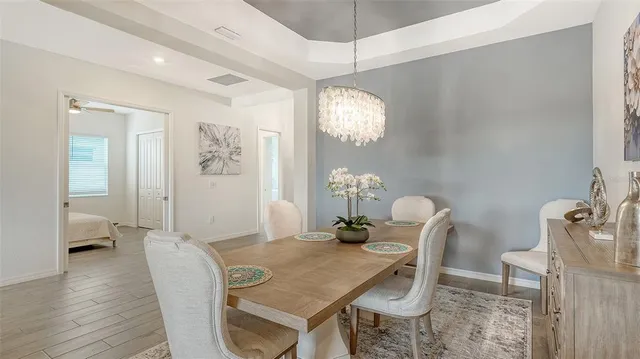 a bathroom with a granite countertop sink mirror and a