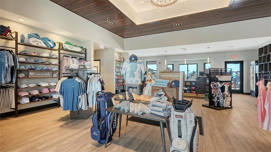 12716 Tulum Loop Venice, FL 34293 - Photo 50 of 97 a view of a dining room with furniture and wooden floor