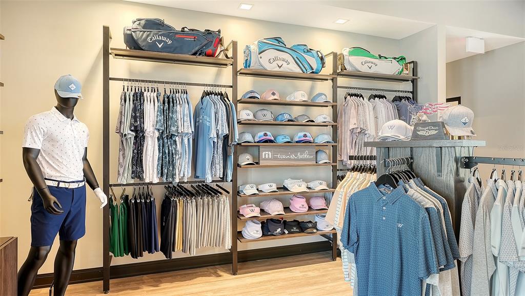 12716 Tulum Loop Venice, FL 34293 - Photo 52 of 97 a view of walk in closet with clothes and shoes