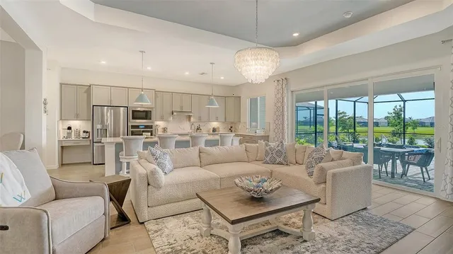 a kitchen with sink refrigerator and window