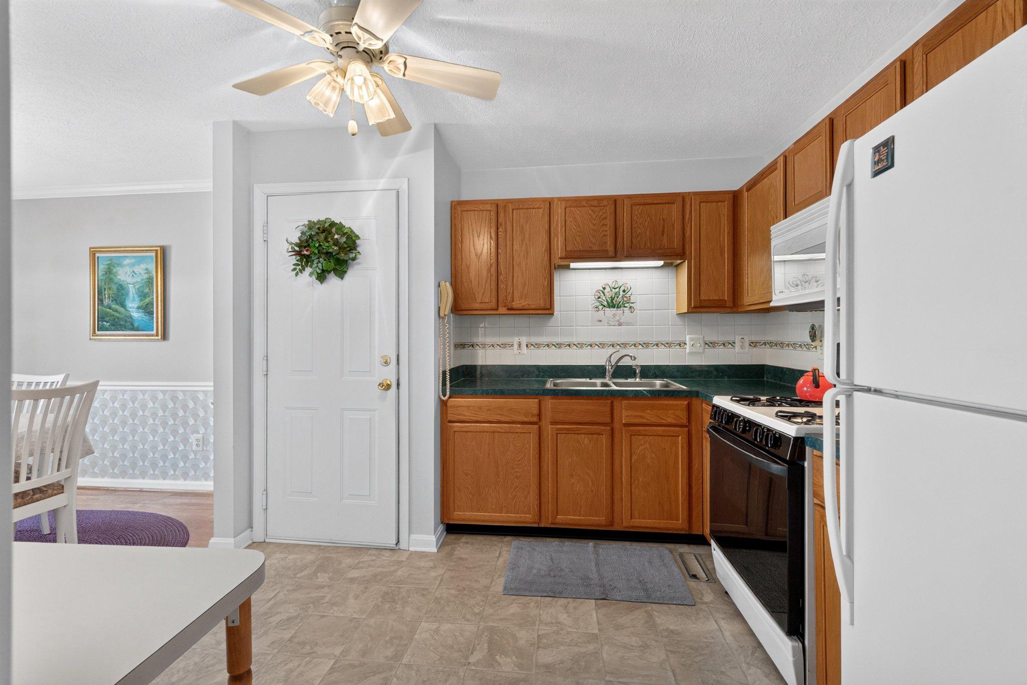 9311 Sea Point Road Baltimore, MD 21219 - Photo 14 of 32 kitchen with door to garage-easy grocery unload.