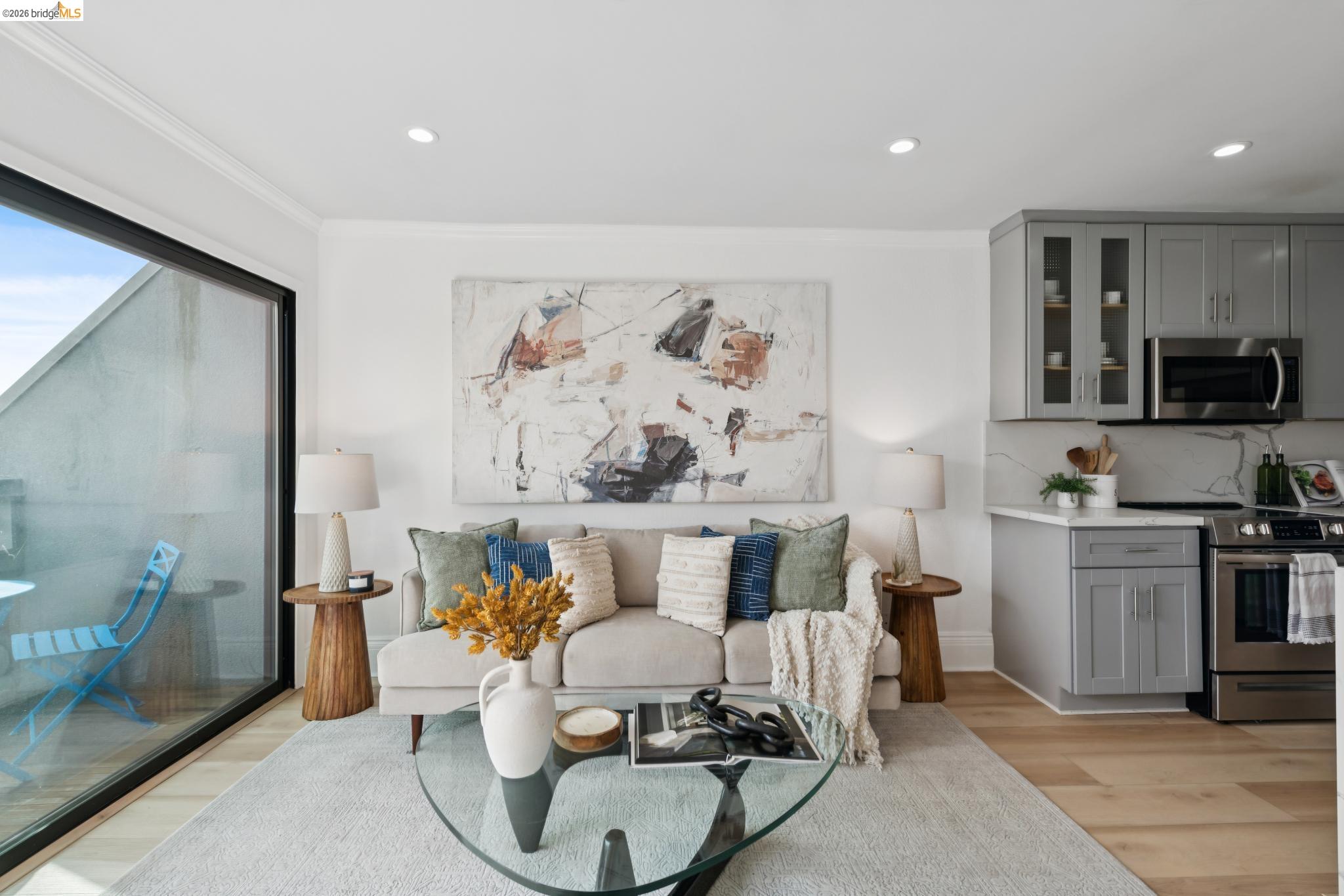 7 Embarcadero, Unit 204 Oakland, CA 94607 - Photo 8 of 27 Sitting room with light wood finished floors, recessed lighting, and crown molding