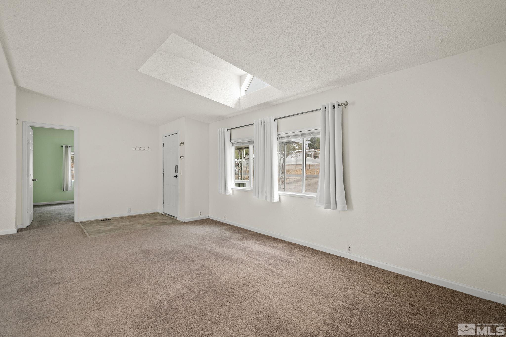 1815 Collins Circle Reno, NV 89506 - Photo 11 of 40 an empty room with windows