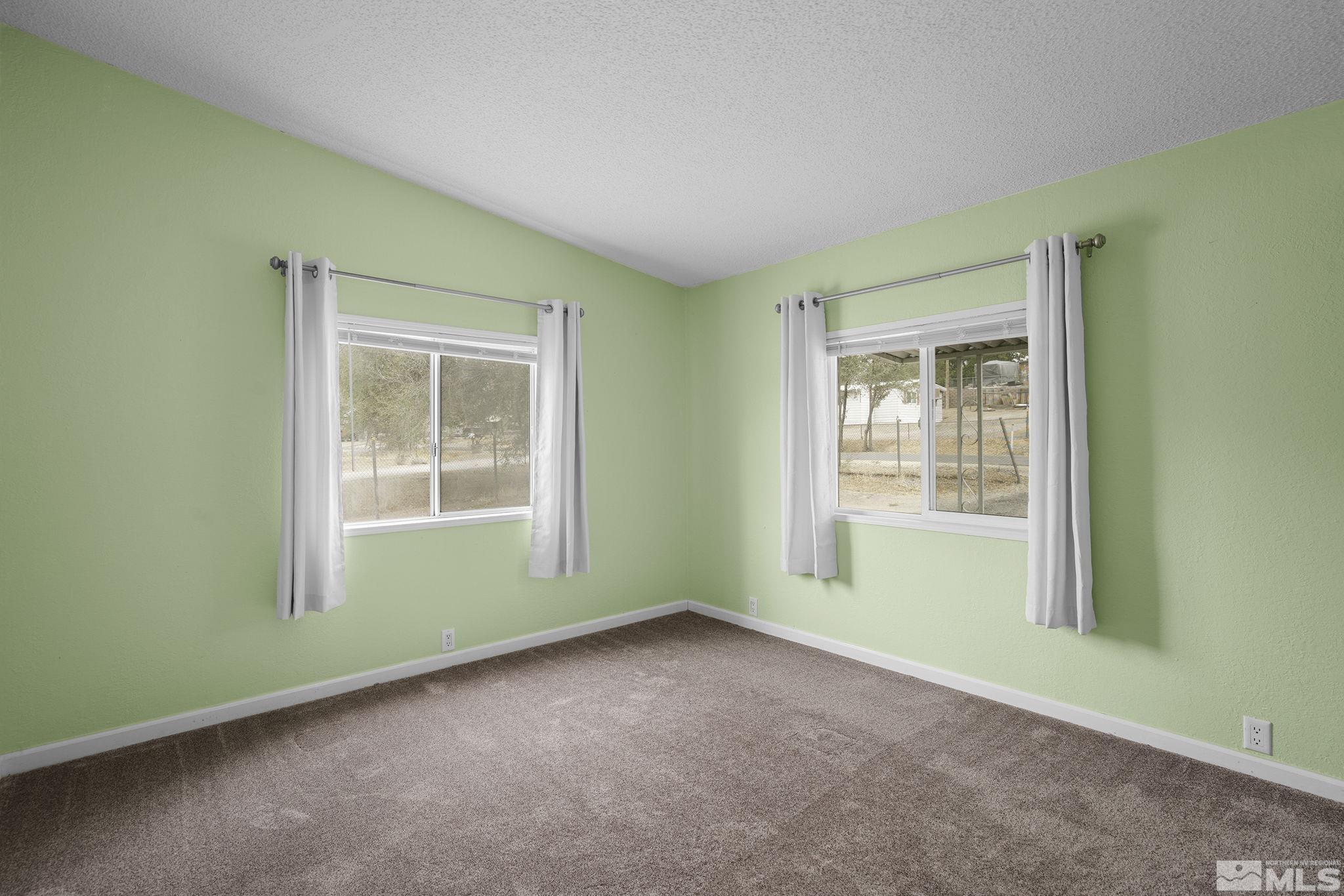 1815 Collins Circle Reno, NV 89506 - Photo 21 of 40 an empty room with a window