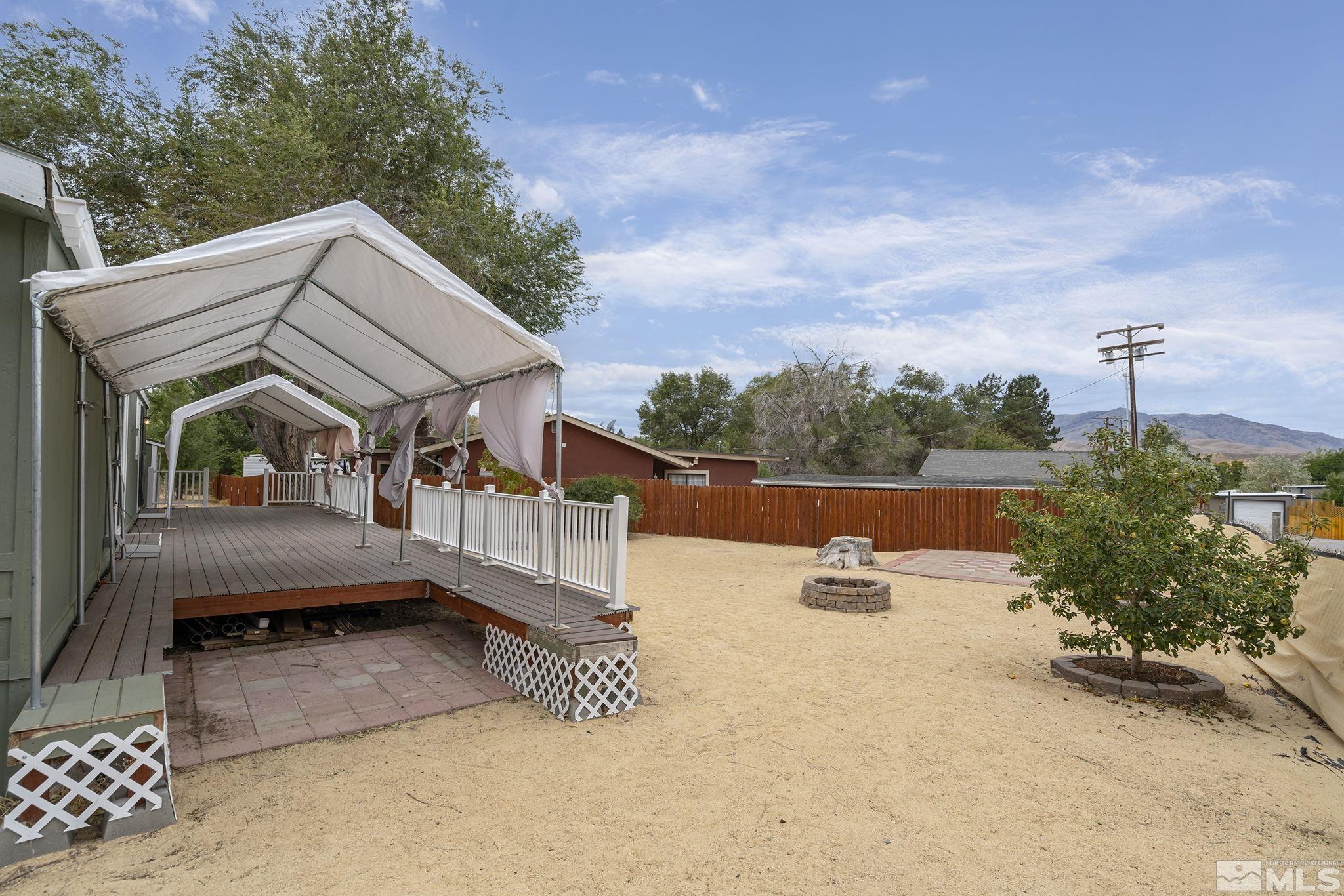 1815 Collins Circle Reno, NV 89506 - Photo 29 of 40 a view of a house with backyard and sitting area