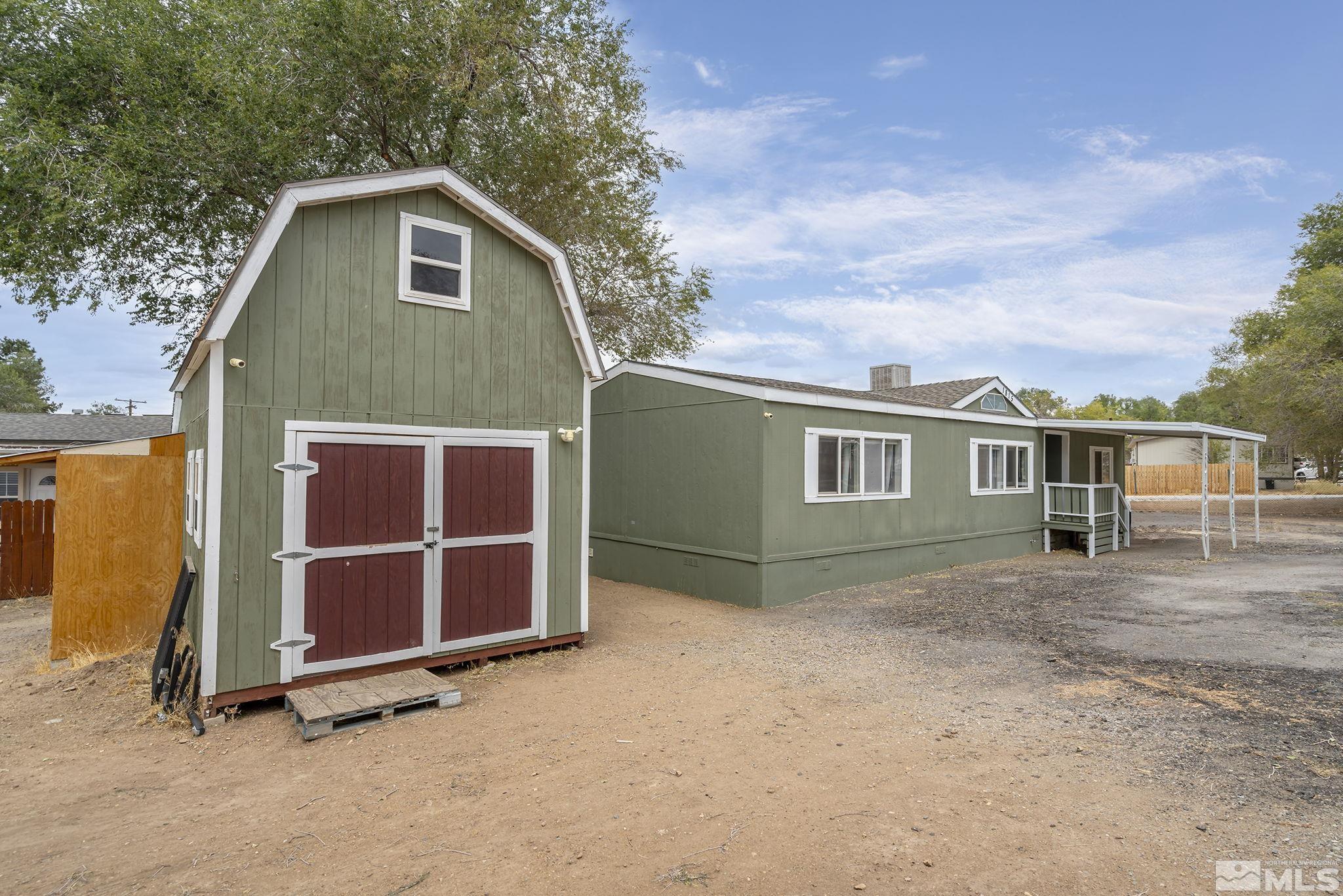 1815 Collins Circle Reno, NV 89506 - Photo 30 of 40 a front view of a house with a yard