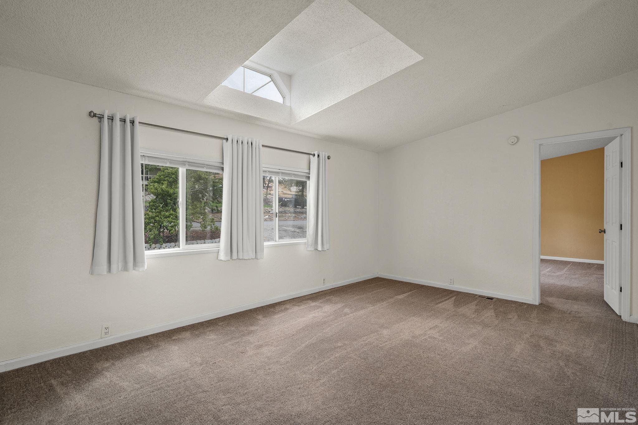 1815 Collins Circle Reno, NV 89506 - Photo 10 of 40 an empty room with a window
