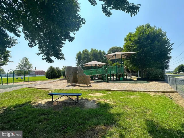 a view of an outdoor space and tennis court