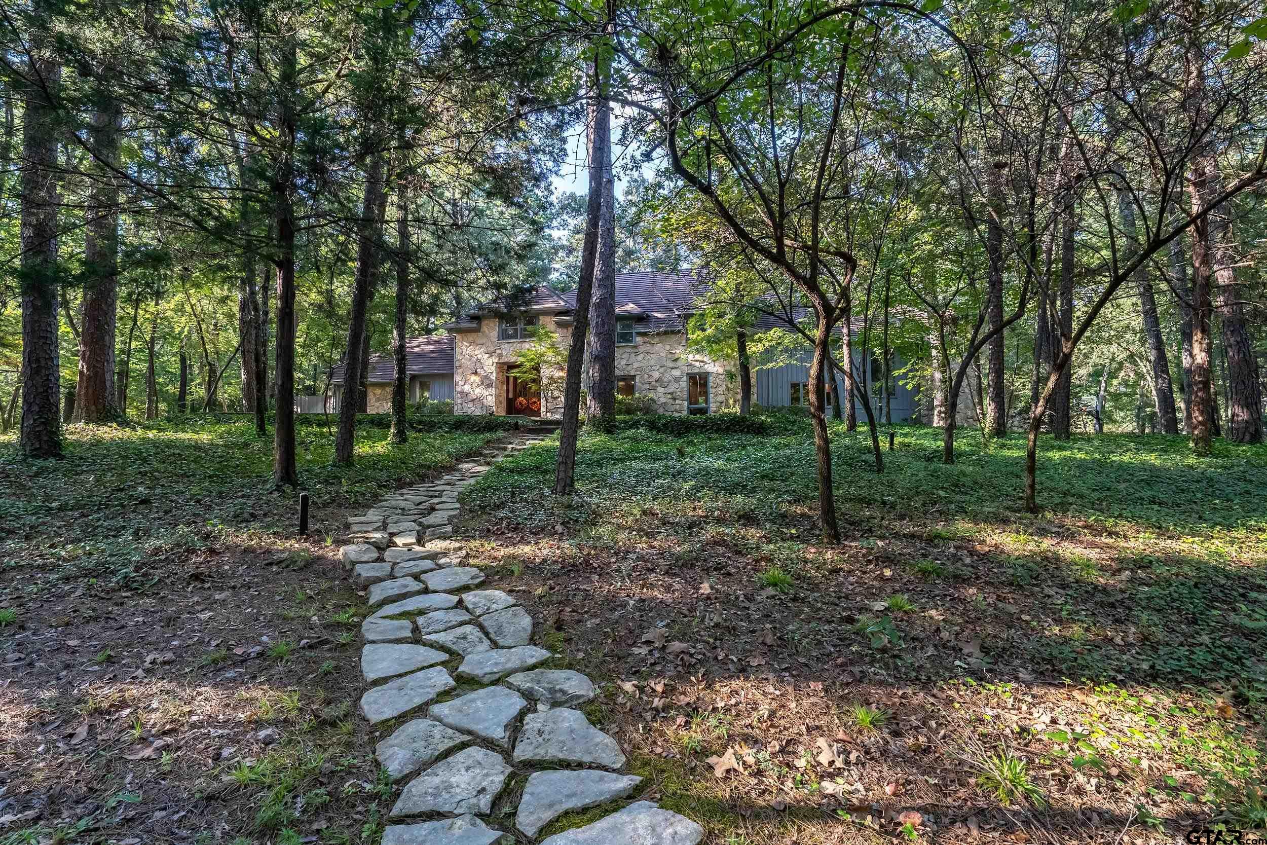 628 Wilder Way Tyler, TX 75703 - Photo 2 of 46 a view of a park with large trees