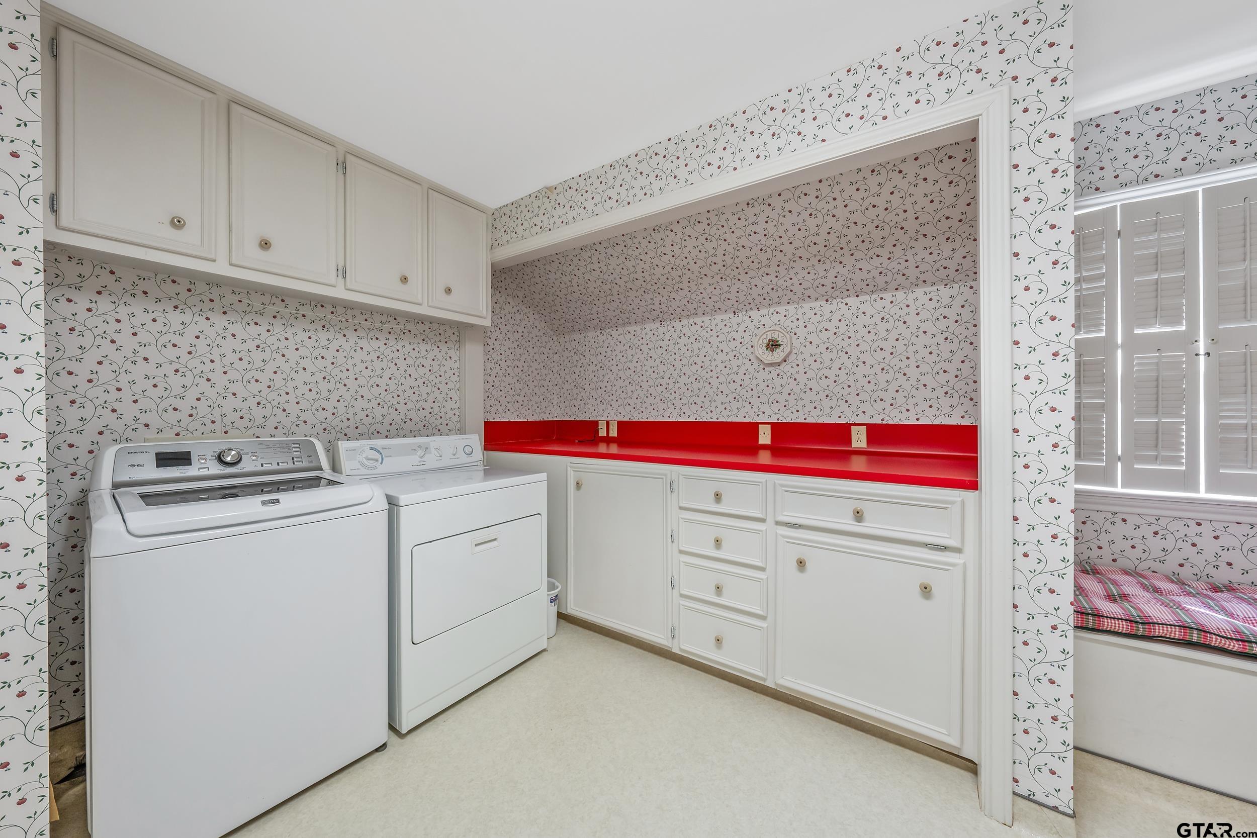 628 Wilder Way Tyler, TX 75703 - Photo 41 of 46 a utility room with dryer and washer