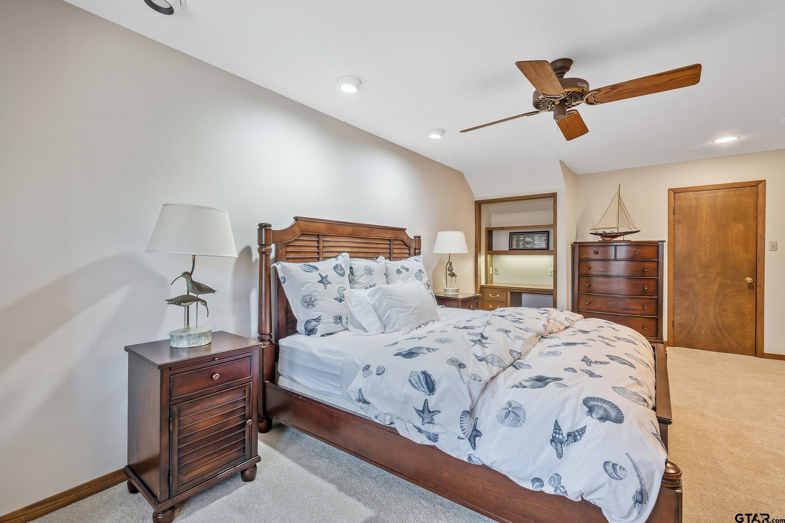 628 Wilder Way Tyler, TX 75703 - Photo 42 of 46 a bedroom with a bed and a dresser