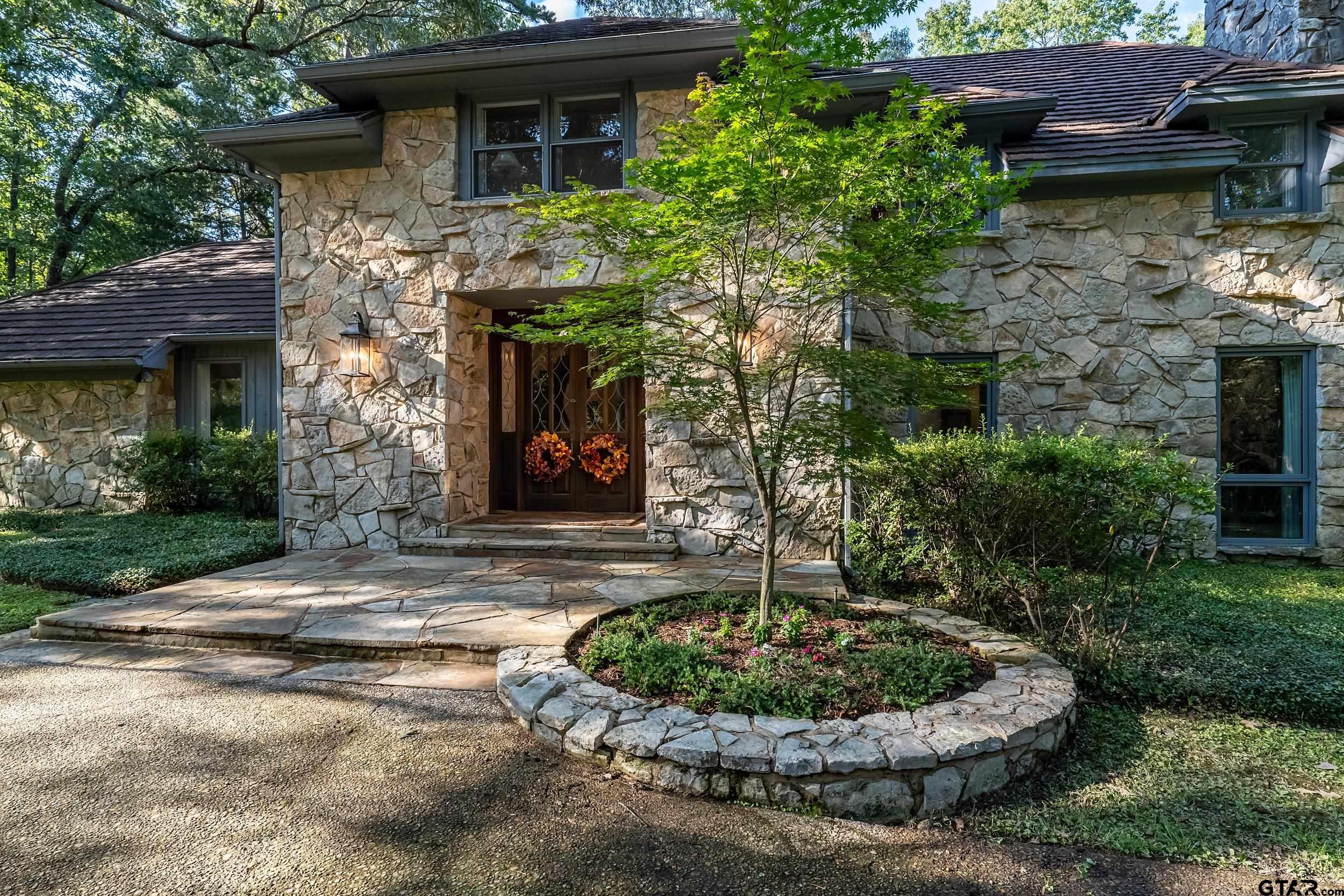 628 Wilder Way Tyler, TX 75703 - Photo 46 of 46 a front view of a house with garden