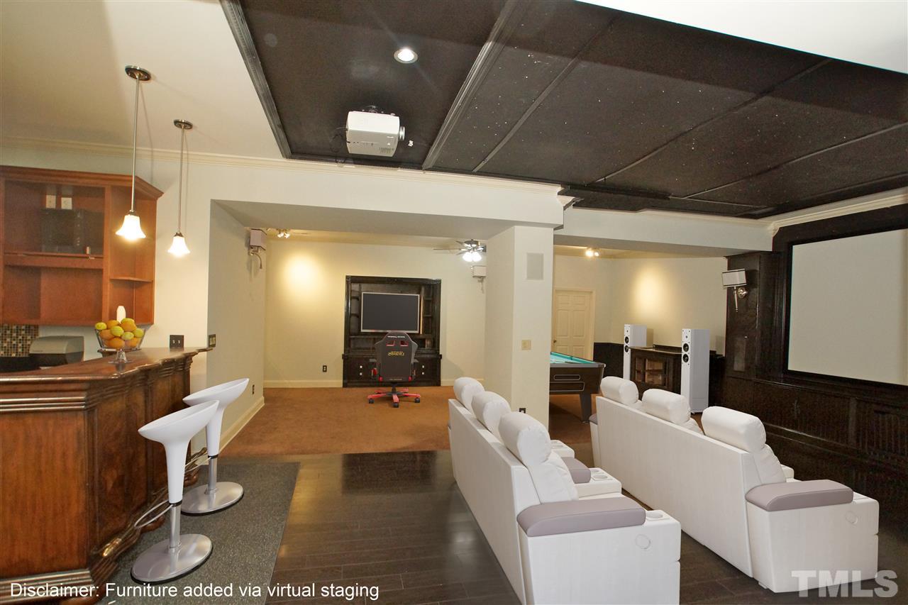 9801 Crooked Tree Lane Raleigh, NC 27617 - Photo 11 of 19 a lobby with furniture and a large mirror