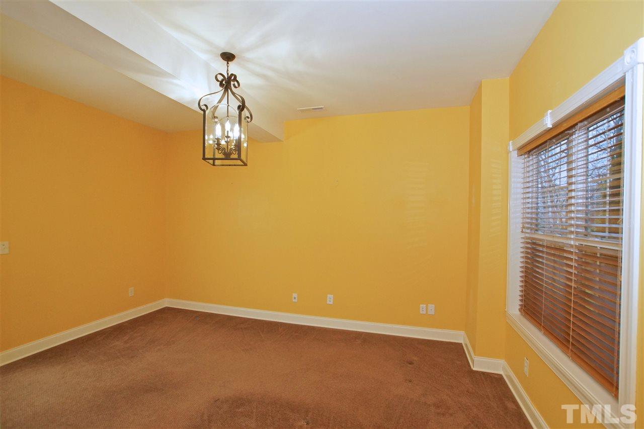 9801 Crooked Tree Lane Raleigh, NC 27617 - Photo 13 of 19 a very nice looking room with a large window