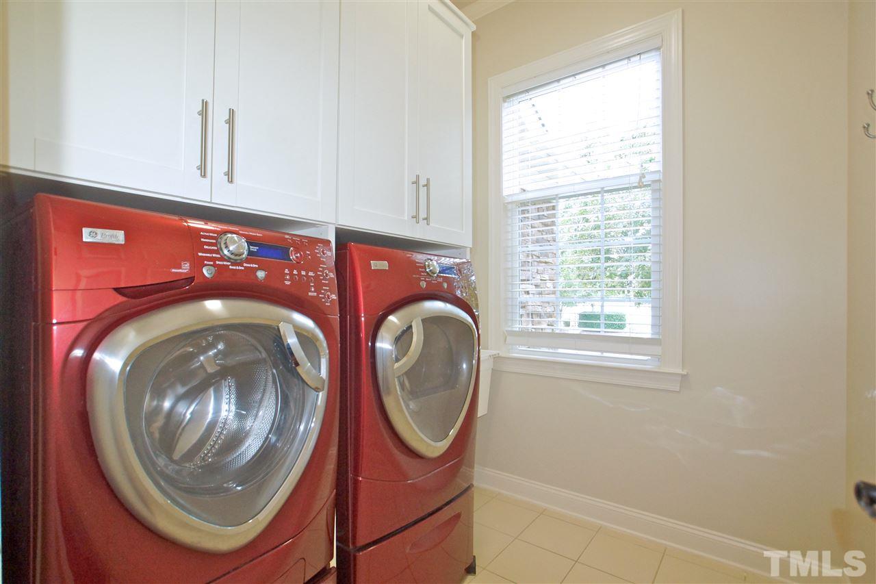 9801 Crooked Tree Lane Raleigh, NC 27617 - Photo 16 of 19 a utility room with dryer and washer