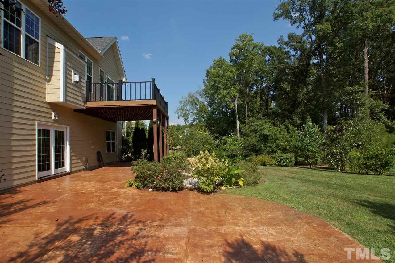 9801 Crooked Tree Lane Raleigh, NC 27617 - Photo 18 of 19 a front view of a house having yard