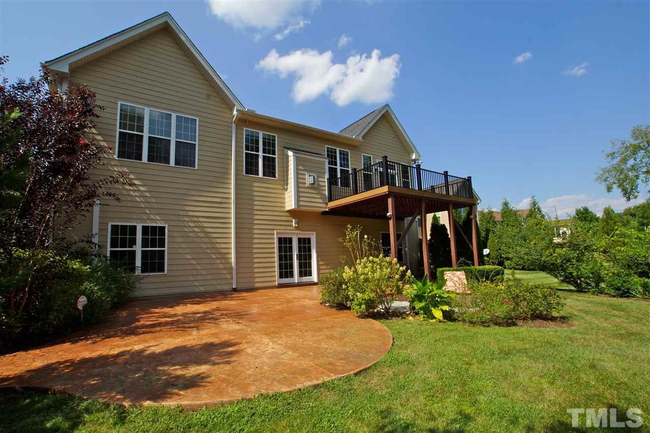9801 Crooked Tree Lane Raleigh, NC 27617 - Photo 19 of 19 a front view of a house with a yard