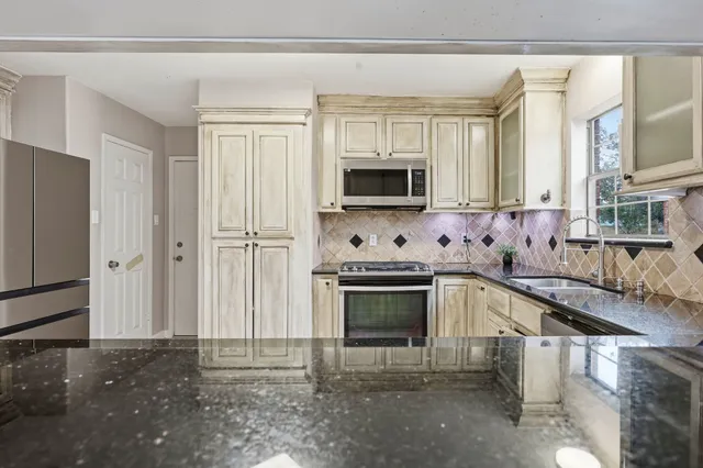 a view of a house with a yard porch and sitting area