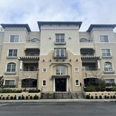 a front view of a building with a street