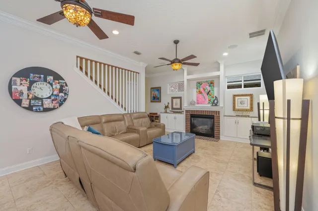a view of livingroom with furniture and windows