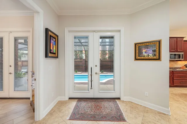 a view of fireplace with a hallway