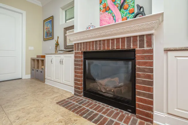 a bedroom with a bed and a ceiling fan