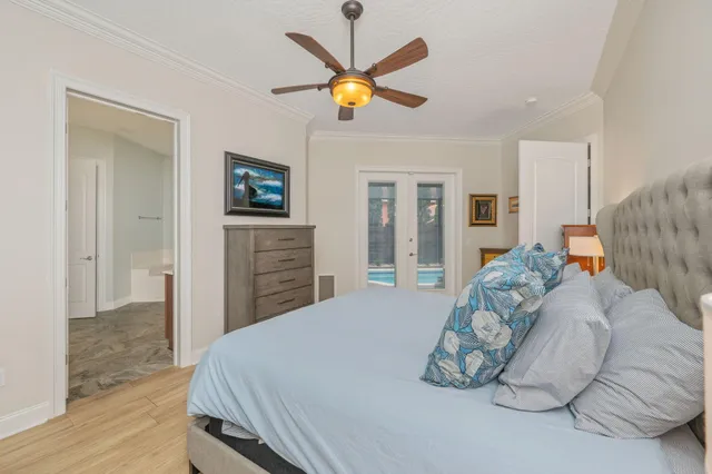 a bathroom with a granite countertop sink vanity and mirror