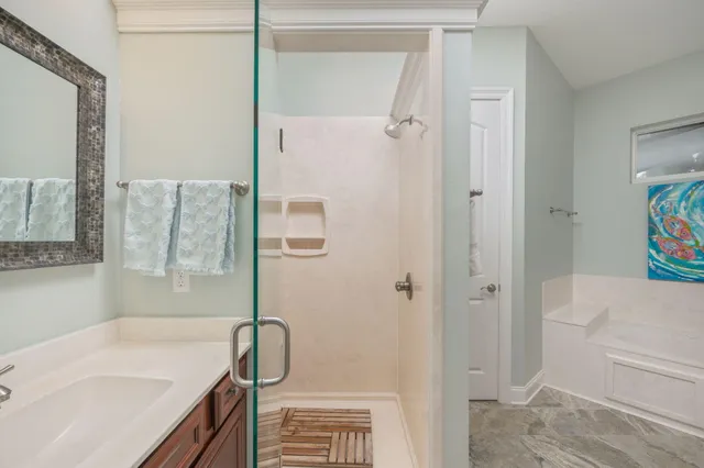 a living room with furniture a fireplace and a window