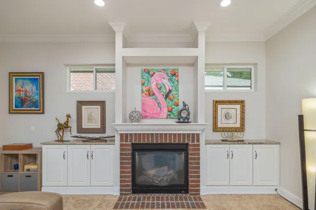 a bed room with a bed and a chandelier