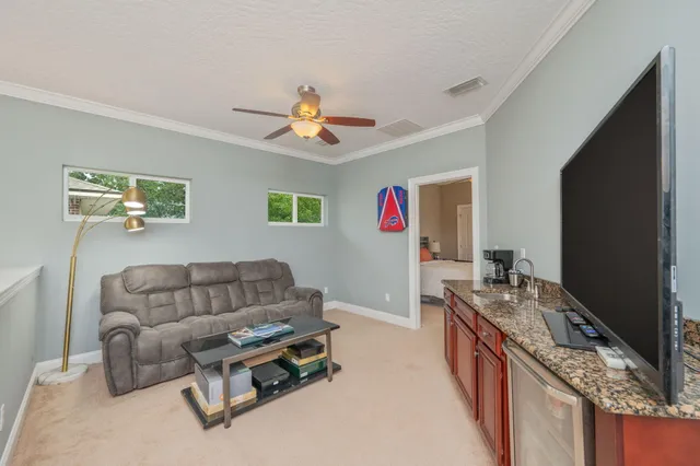 a view of swimming pool with a patio