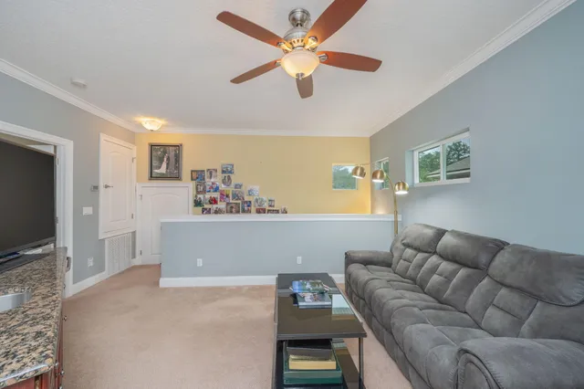 a view of a backyard with basket ball court