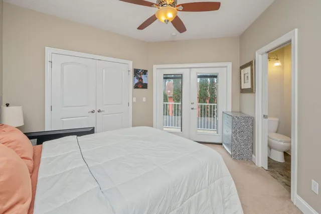 a view of a chairs and tables in the back yard of the house