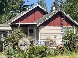 8731 Garrison Road Everson, WA 98247 - Photo 1 of 1 a view of small house with yard and sitting area