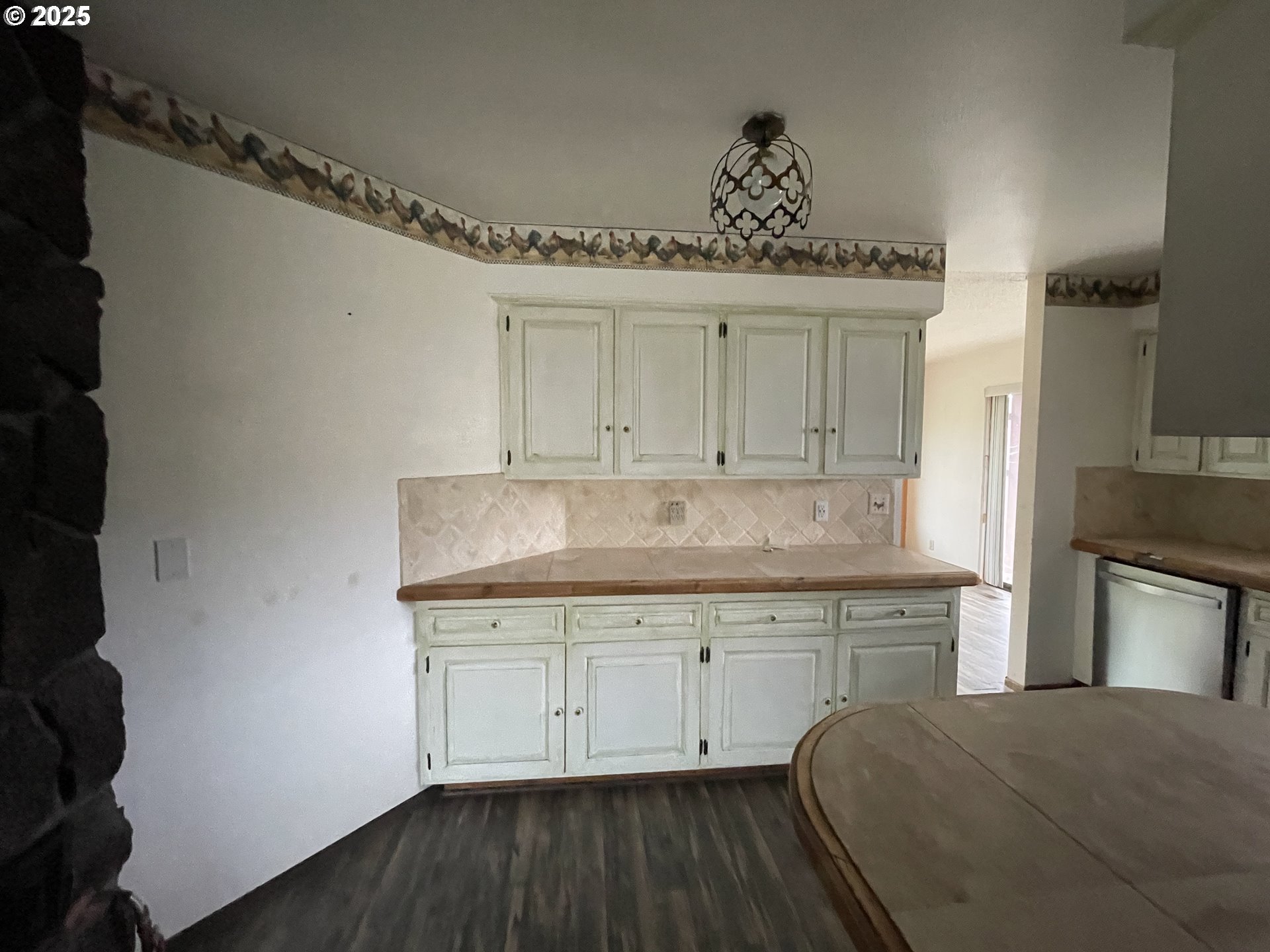 801 Ferguson Road John Day, OR 97845 - Photo 13 of 43 a kitchen with a sink and cabinets