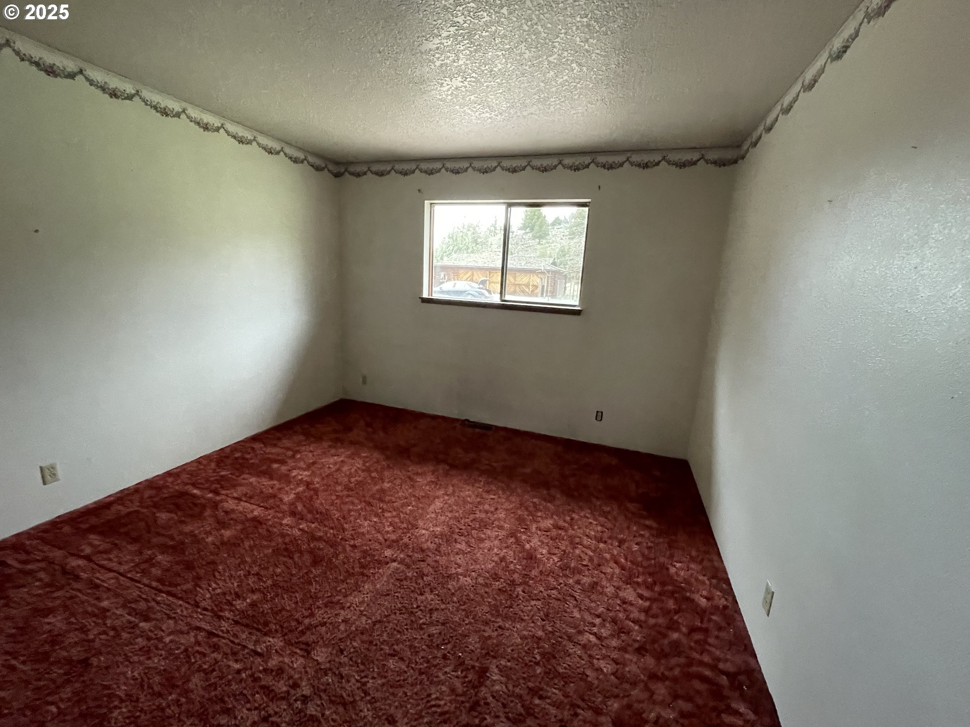 801 Ferguson Road John Day, OR 97845 - Photo 21 of 43 a view of a room with a window