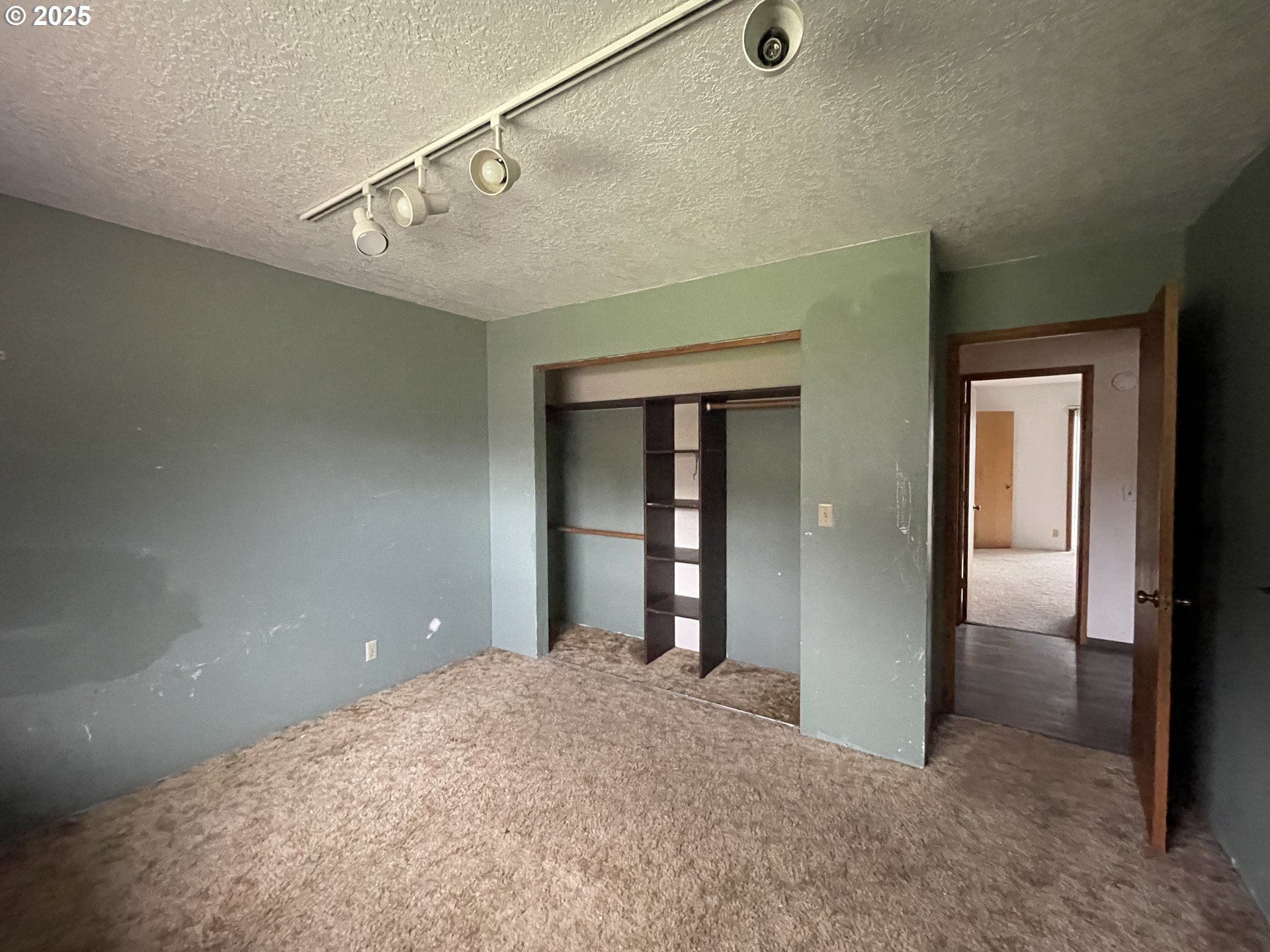 801 Ferguson Road John Day, OR 97845 - Photo 26 of 43 a view of a big room with closet and windows