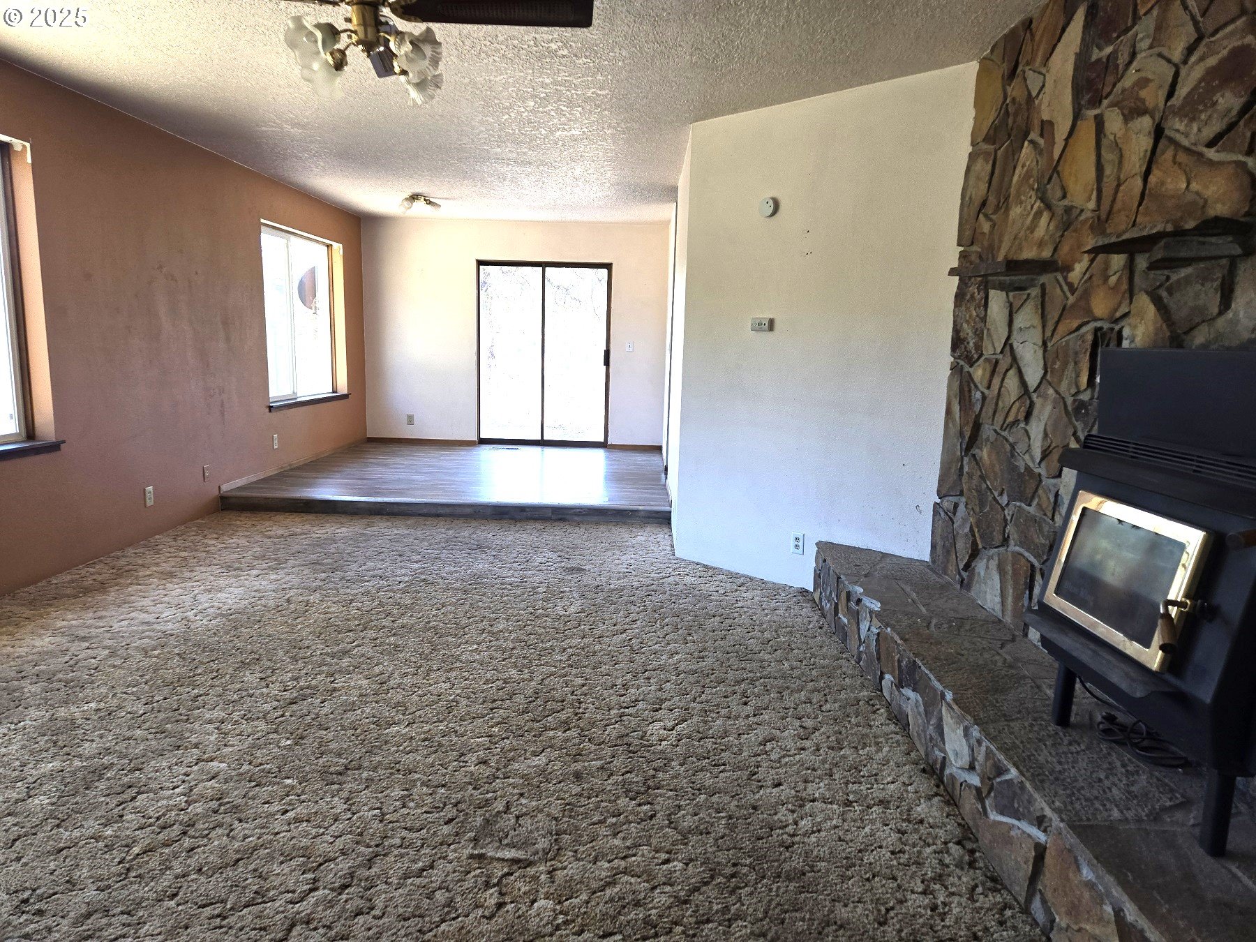 801 Ferguson Road John Day, OR 97845 - Photo 4 of 43 a view of an empty room with windows