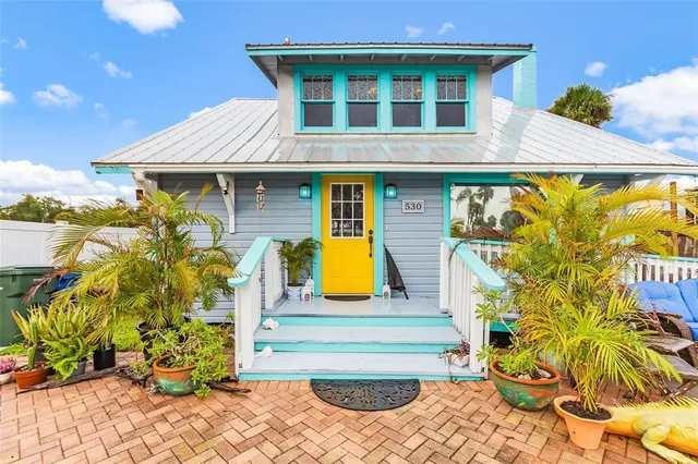 a view of a house with a swimming pool
