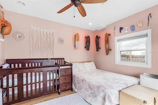 a living room with stainless steel appliances kitchen island granite countertop furniture and a large window