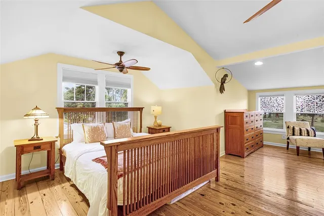 a living room with furniture and air hockey table