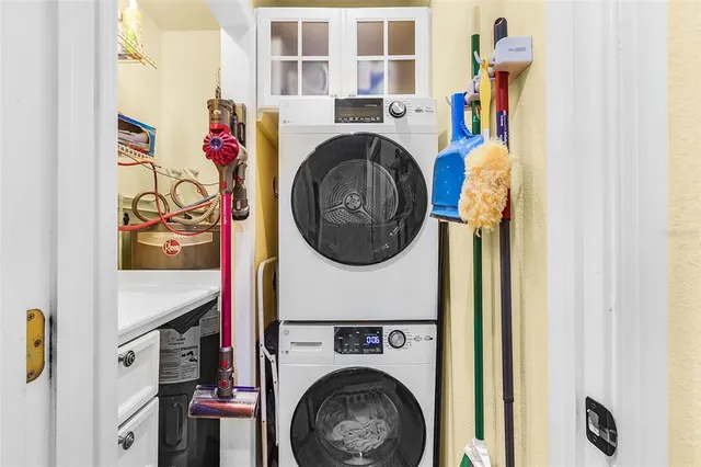 an aerial view of a house with garden space and outdoor seating