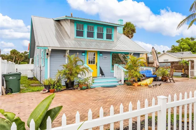 a bedroom with furniture and window