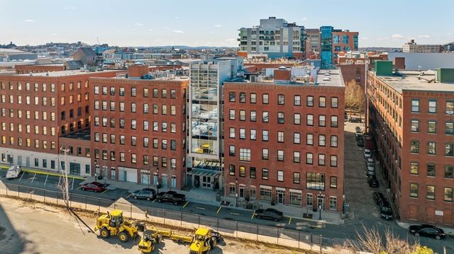 a view of city with tall buildings