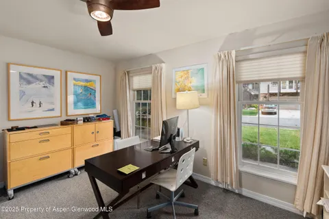 a room with furniture and window