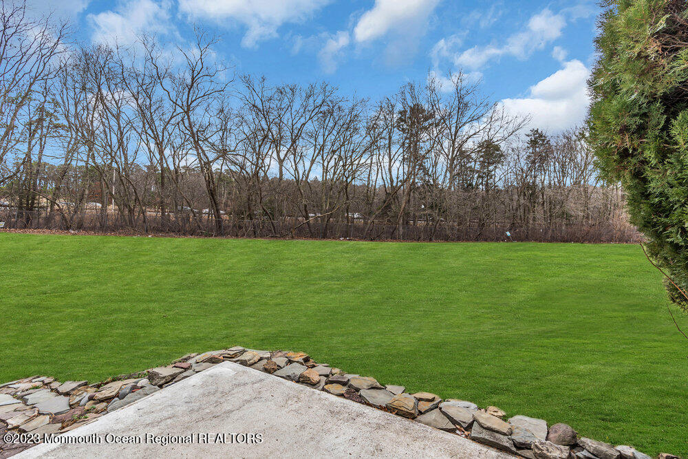619 Sandra Place Brick, NJ 08724 - Photo 12 of 12 a view of a golf course with a garden