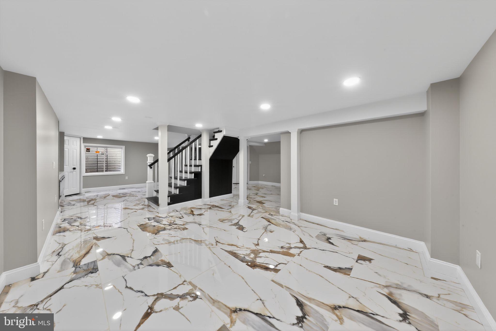 144 Plain Dealing Road Magnolia, DE 19962 - Photo 24 of 32 Elegant basement with stunning marble floors.