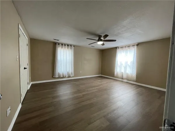 a view of small space with wooden floor