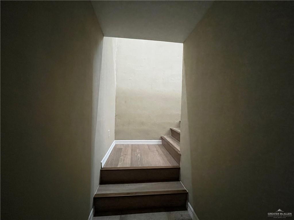 8006 Senecio Street Mission, TX 78574 - Photo 20 of 31 a view of small space with racks on the wall